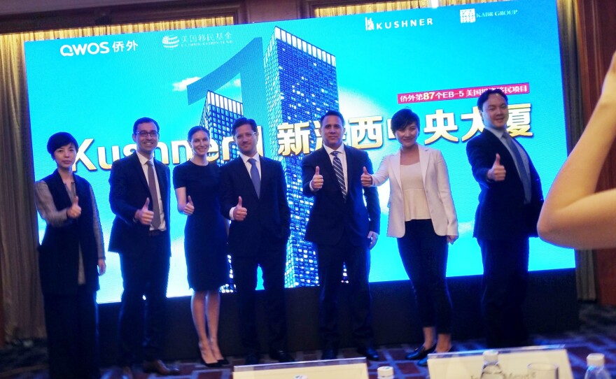 Nicole Kushner Meyer (third from left), the sister of White House senior adviser Jared Kushner, poses at a promotional event in Shanghai on Sunday.