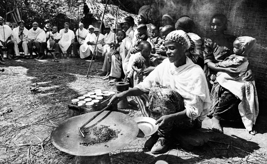 Villagers performing a coffee ceremony during coffee-picking season in Ethiopia.