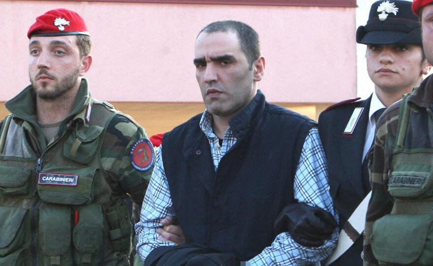Salvatore Coluccio, alleged head of Calabrian mafia crime group 'Ndrangheta, is one of many mafiosi children born into the family business. He's seen being escorted by police special forces following his 2009 arrest.