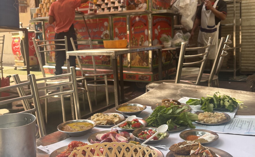Nasser Al Fayoumi food cart and restaurant in downtown Cairo. Thousands of affordable ful and taamiya dishes and sandwiches are served daily here.