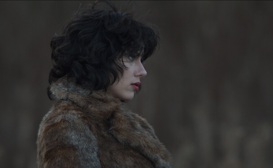 In <em>Under The Skin</em>, Scarlett Johansson plays an alien who adopts an English accent and cruises Scotland enticing hitchhikers into a darkened building.