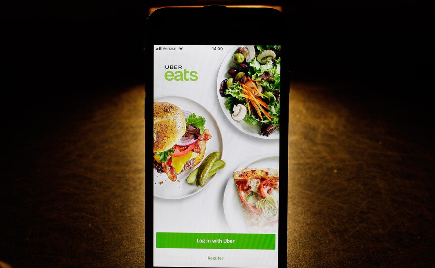 In this Feb. 20, 2018, file photo shows the Uber Eats app on an iPhone in Chicago.
