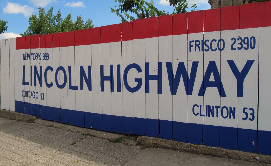 A large sign outside the headquarters gives travelers a rough mileage to various spots along the route, including New York and San Francisco.