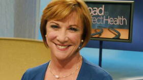 Promotional photo of Brenda Watson on stage for the taping of "The Road to Perfect Health."