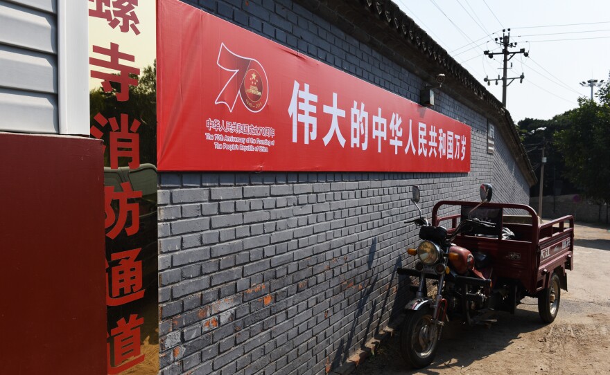 Banners, signs and giant floral arrangements have gone up all over Beijing to celebrate the 70th anniversary of the founding of modern China.