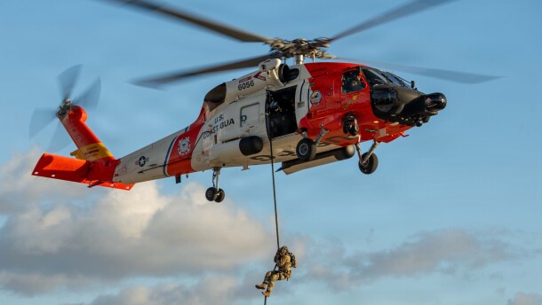 A U.S. Coast Guard Maritime Security Response Team West member fast ropes from a MH-60 Jayhawk helicopter at Air Station San Diego, Jan. 8, 2026. The Coast Guard is reportedly still receiving pay despite a partial government shutdown.