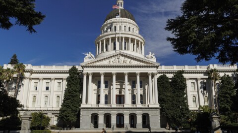 People walk around the California State Capitol, Aug. 5, 2024, in Sacramento, Calif.