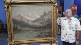 At ANTIQUES ROADSHOW in Madison, Wisconsin, this guest brings in a very large oil painting he bought for $25at a church rummage sale in 1984. Appraiser Alan Fausel reveals that the piece is by famous California painter Thomas Hill, known for his views of Yosemite Valley, and would likely bring an auction value of $60,000 to $80,000.