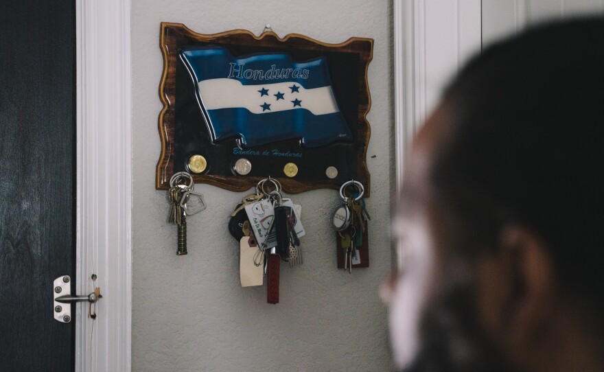 Edmund Garcia's keys hang on a Honduran Flag key holder.