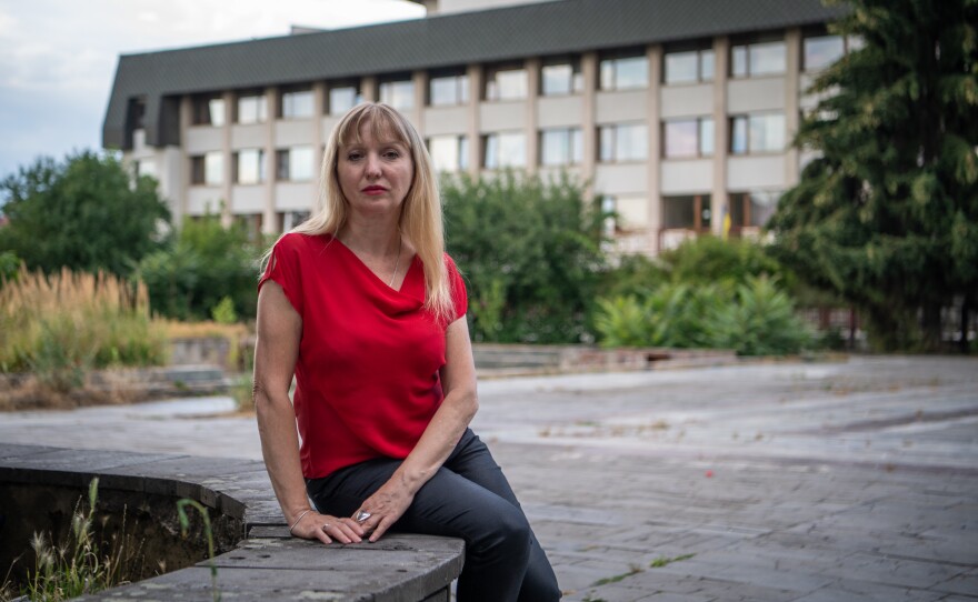 Liudmyla Kolosovych, director of the Donetsk Regional Drama Theatre of Mariupol's play "Cry of a Nation", poses outside the Uzhhorod municipal theatre on July 14, 2022.