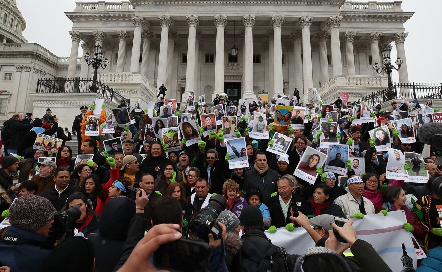 People who call themselves DREAMers protest in front of the Senate side of the U.S. Capitol to urge Congress in passing a legislative fix for the Deferred Action for Childhood Arrivals (DACA) program, on December 6, 2017, in Washington, D.C.
