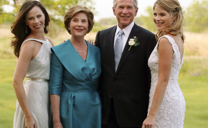 President George W. Bush and first lady Laura Bush pose with their daughters Jenna Bush, 26, right, and Barbara Bush, left, prior to Jenna's marriage to Henry Hager at the family's ranch in Crawford, Texas.