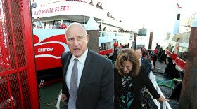 California Gov. Jerry Brown, and his wife, Anne Gust Brown, leave the high-tech battery-operated San Francisco Bay sightseeing boat, Enhydra, Sept. 13, 2018.