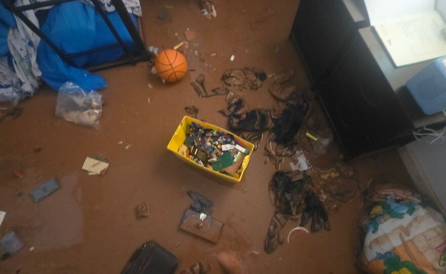 Floodwater filled one of the rooms for Juana Puga's kids in Hurricane, Utah.