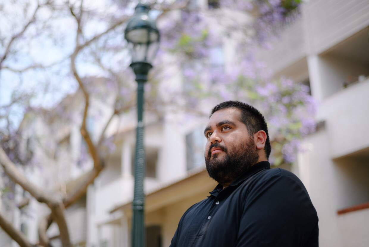 Sebastian Martinez, deputy executive director of Advocates for Just and Moral Governance, stands for a portrait at Memorial Park in Chula Vista on July 10, 2024.