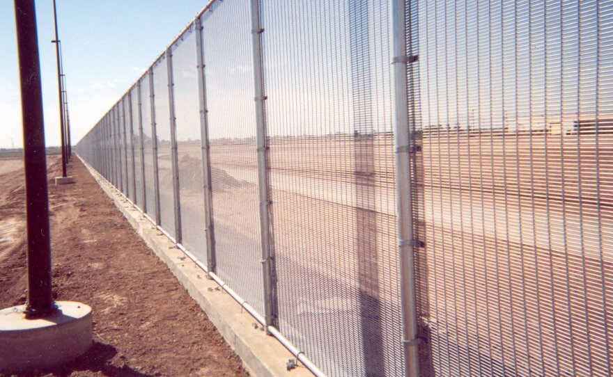 The WireWall fence now in place in California on the border with Mexico. Riverdale Mills says the fence is produced using the same manufacturing process as its "marquee marine wire mesh" designed for lobster traps used in New England.