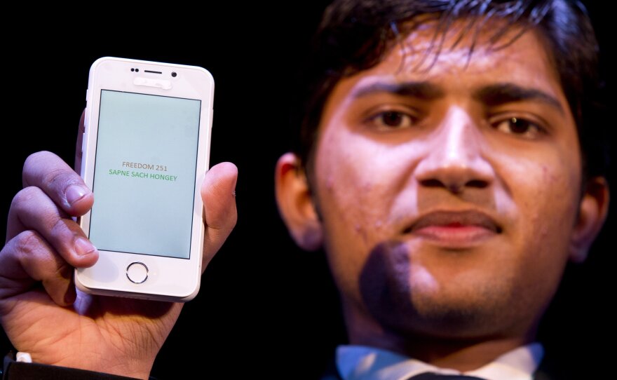 A Freedom 251 smartphone, priced at 251 rupees (less than $4), which went on sale Thursday. Its maker, Ringing Bells, says interest overwhelmed its website.