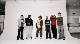 MIKE (second from left) and Earl Sweatshirt (third from left) with the members of Surf Gang, the New York-based collective who produced the rappers' new double album, Pompeii // Utility.