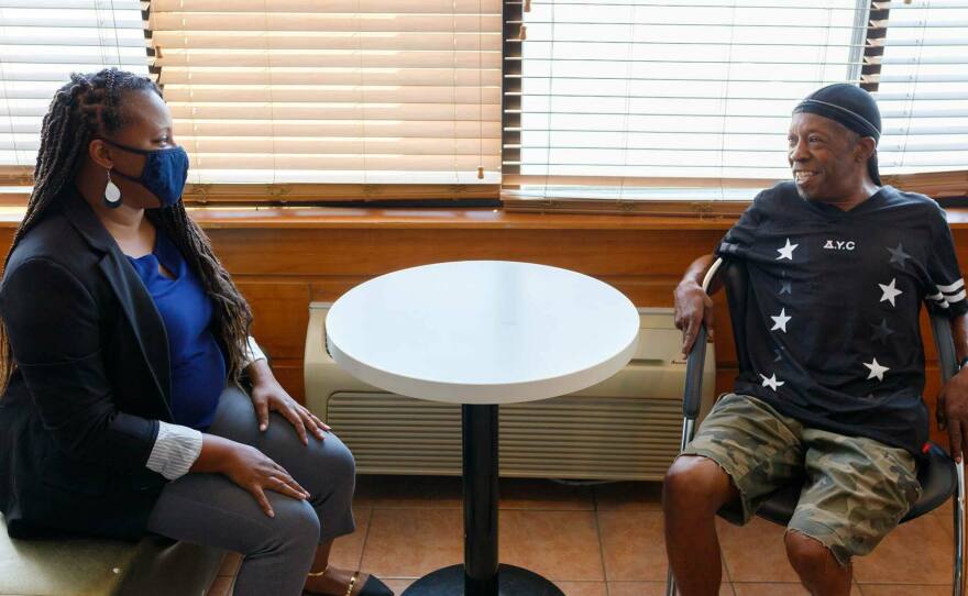 Community Solutions received $100M from the MacArthur Foundation "to accelerate an end to homelessness in 75 communities." Erica Holmes interacting with Community Solutions' client Andrew Overby.