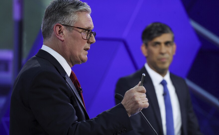 British Prime Minister Rishi Sunak (right) and opposition Labour Party leader Keir Starmer take part in a BBC debate, in Nottingham, England, on June 26.