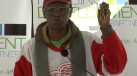 Dallas Edge holds up his new set of keys to his studio home at The Mason, on February 28, 2013.  The restored low-income housing unit on Fifth Avenue in downtown San Diego is one of several projects to help end chronic homelessness. 