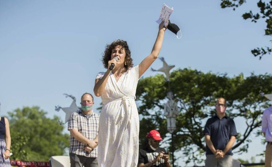 Minneapolis City Council Member Alondra Cano speaks to a crowd that gathered at Powderhorn Park last June. During the event, Cano and eight other Minneapolis City Council members declared their commitment to defunding and dismantling the Minneapolis Police Department. But their support has changed since then.