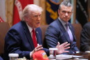 President Donald Trump speaks during a Cabinet meeting at the White House, Wednesday, May 27, 2026, in Washington, as Secretary of Defense Pete Hegseth, looks on.