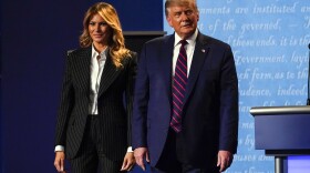 President Donald Trump stands on stage with first lady Melania Trump after the first presidential debate with Democratic presidential candidate former Vice President Joe Biden Tuesday, Sept. 29, 2020, at Case Western University and Cleveland Clinic, in Cleveland, Ohio. 