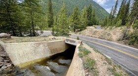 Water in Lost Man canal passes underneath Highway 82 on Independence Pass in this photo taken June 17, 2021. It’s a small part of a massive plumbing system that carries high-altitude snowmelt and rainfall through Colorado’s mountains to its populated cities.