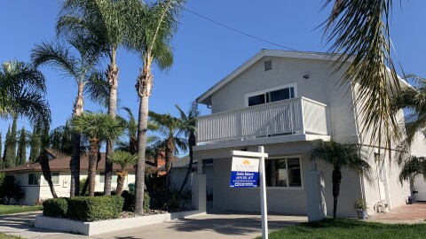 A home is listed for sale in the San Carlos neighborhood of San Diego, April 3, 2021.