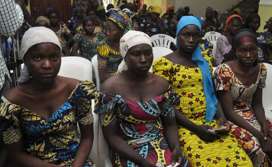 Some of the recently freed girls from Chibok wait in Abuja on May 7, 2017 to meet President Muhammadu Buhari after a prisoner swap deal secured their release.