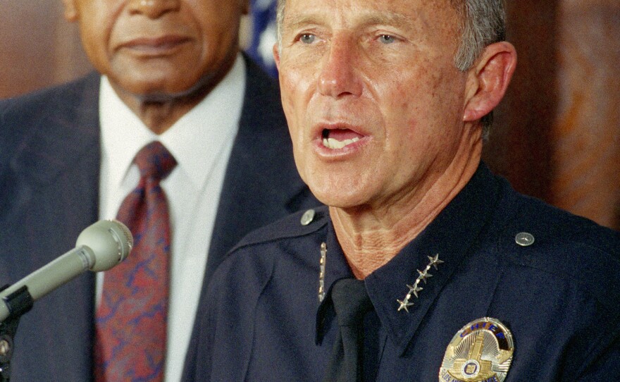 Los Angeles police chief Daryl Gates, along with Mayor Tom Bradley, answers questions  about the violence that broke out on April 30, 1992.
