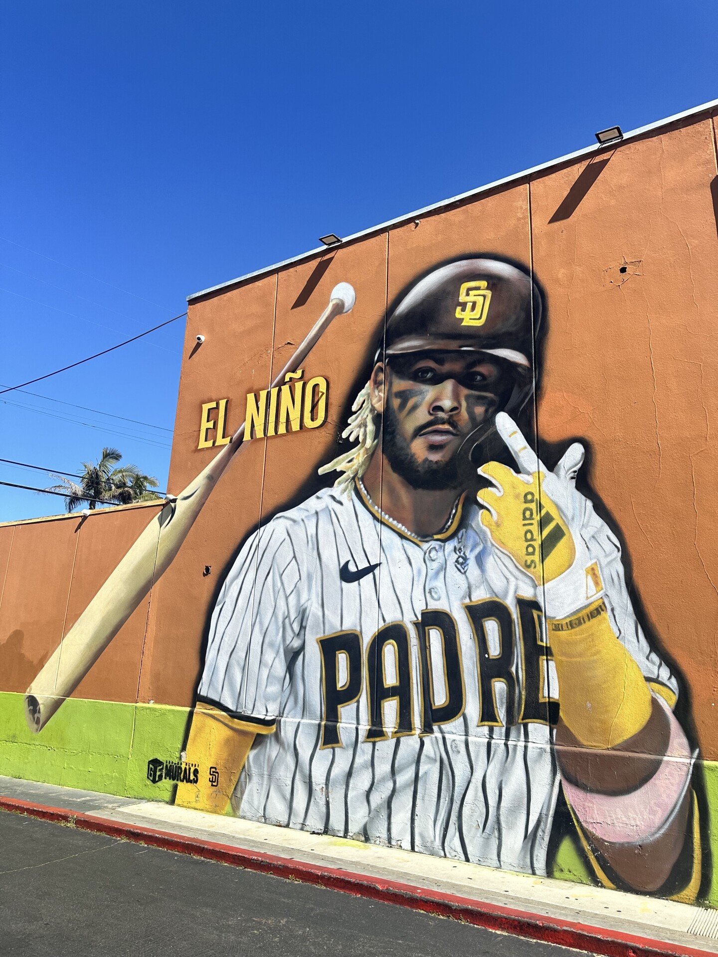 Painted by the Ground Floor Murals crew, this Ocean Beach mural of Padres right fielder Fernando Tatis Jr. captures his iconic bat flip moment from the 2020 National League Division Series versus the St. Louis Cardinals. (May 12, 2021)