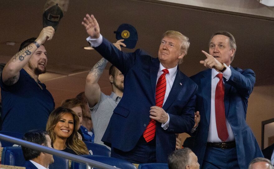President Trump stands during Game 5 of the World Series at Nationals Park in Washington, D.C., last October.
