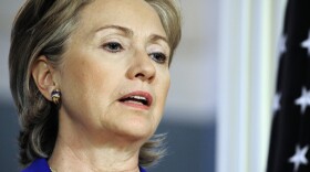 Secretary of State Hillary Clinton will visit seven African nations in the course of an 11-day trip.  She's shown speaking at a June news conference with Zimbabwe's prime minister, in Washington.