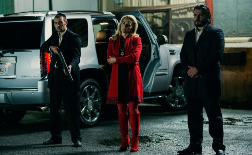 Kate Winslet (center) plays a woman who ruthlessly runs a Russian mob in her husband's absence in "Triple 9."