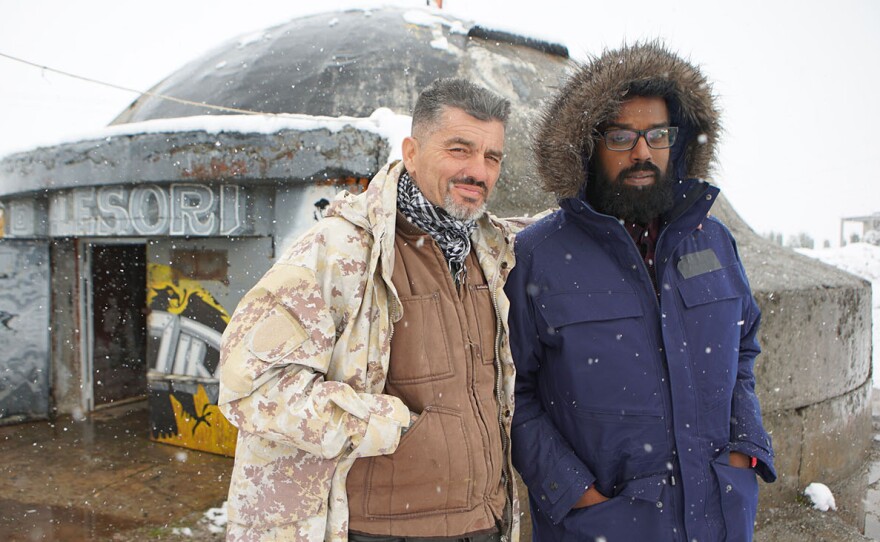 Romesh Ranganathan with tattoo artist at the tattoo bunka, Albania.