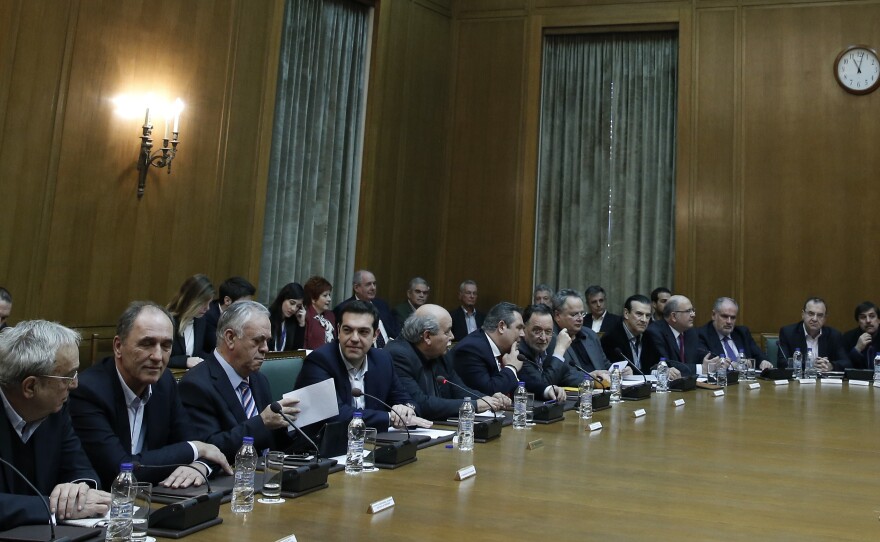Greek Prime Minister Alexis Tsipras leads the first cabinet meeting of his government Jan. 28 at the Parliament in Athens. He's been criticized for selecting no women for senior positions.