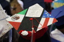 A student's graduation cap reads "God, parents and grandparents, this accomplishment is " on Tuesday, June 9, 2026.