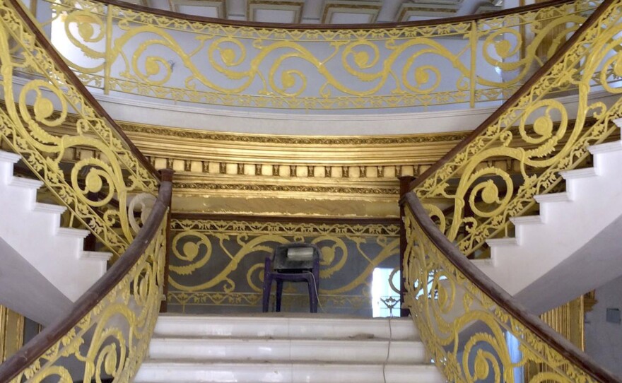 The banister of the grand staircase inside the Kurdish version of the White House is covered in 21-karat gold leaf.