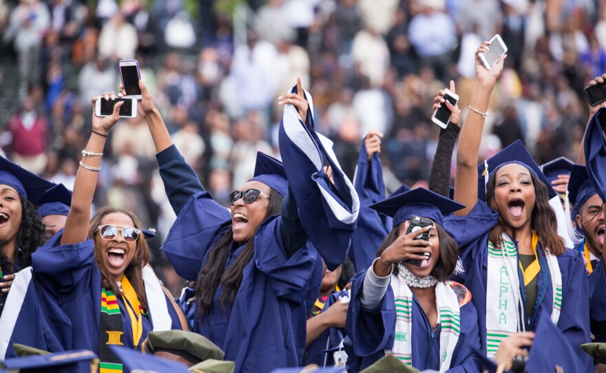 Students celebrate their graduation from Howard University at the end of the 148th Commencement ceremony, at the Upper Quandrangle on campus, on May 7, 2016. Washington, D.C. photojournalist and professor Cheriss May spoke about her photography on <em>The Black Shutter Podcast.</em>