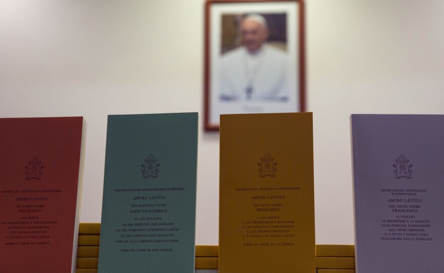 Copies of the post-synodal apostolic exhortation "Amoris Laetitia" (The Joy of Love) are on display at a press conference at the Vatican on Friday. In it, Pope Francis writes that individual conscience should be the guiding principle for Catholics negotiating the complexities of sex, marriage and family life.