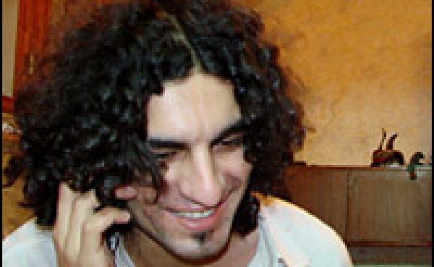 Rasheed says goodbye to his family before leaving Damascus to perform at a dance festival in Holland.