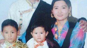 Lotte Lama is seen with his wife and two sons in Nepal in this undated photo.