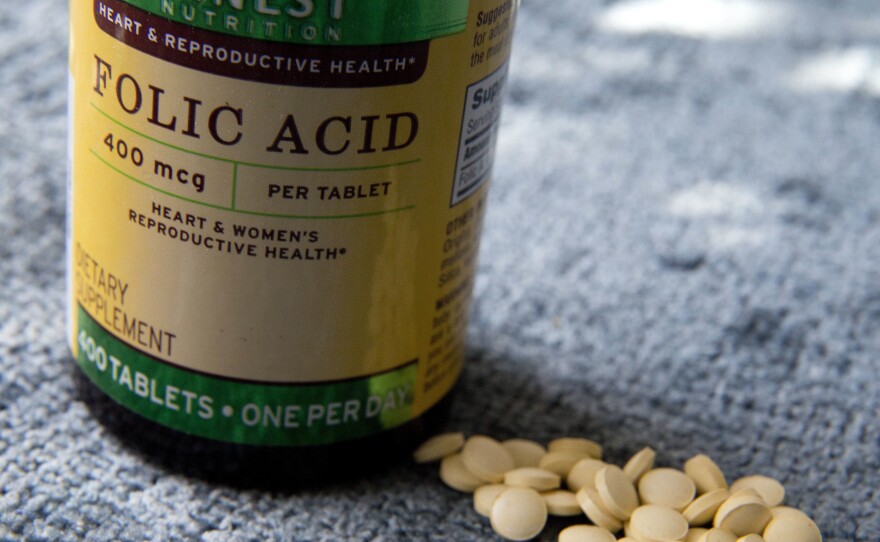 Folic acid in food might not be enough to prevent birth defects, a federal advisory panel says. Thus the recommendation for supplements.