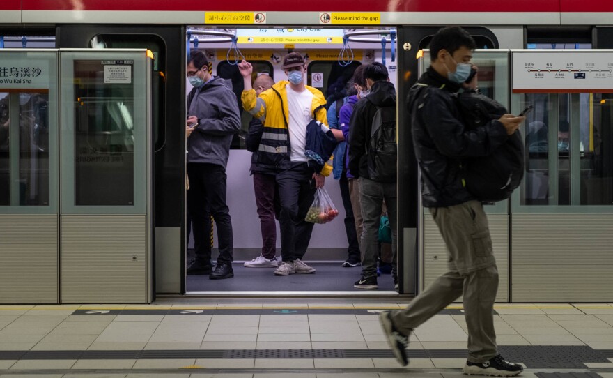 On the mass transit rail system in Hong Kong, announcements remind people to wash their hands and cover their coughs.
