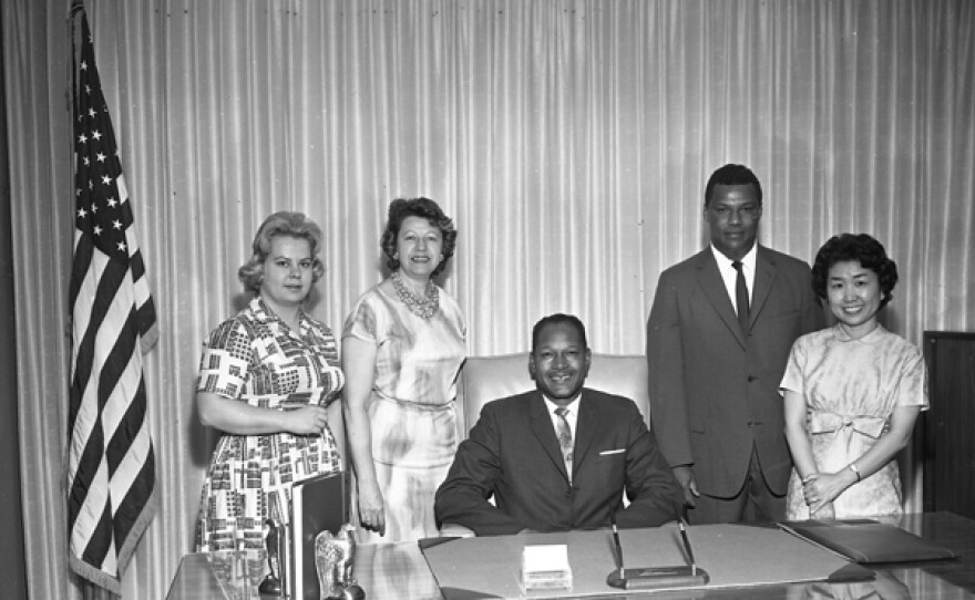 Los Angeles City Councilman Tom Bradley with his diverse staff, 1960s.