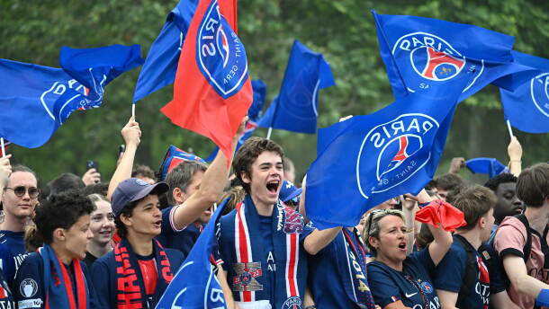 PSG fans celebrate the day after winning the Champions League title, at the Eiffel Tower, in Paris, Sunday, May 31, 2026.