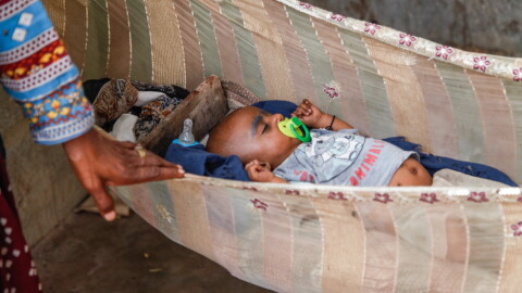 Baby Ladoo's grandmother, Hanifa, rocks the hammock where the 5-month-old stirs. His mother Mariam, 17, says her son was born prematurely at around seven months gestation. She couldn't afford follow-up care, so she bought him home and is hoping for the best. About 1 in 4 babies in this fishing settlement of Rehri Goth are born prematurely, nearly double the national rate of 14% — and that's one of the world's highest. Scientists in a nearby university say they may have uncovered a bacteria that acts as an indicator of whether a women is likely to birth full term or pre-term.
