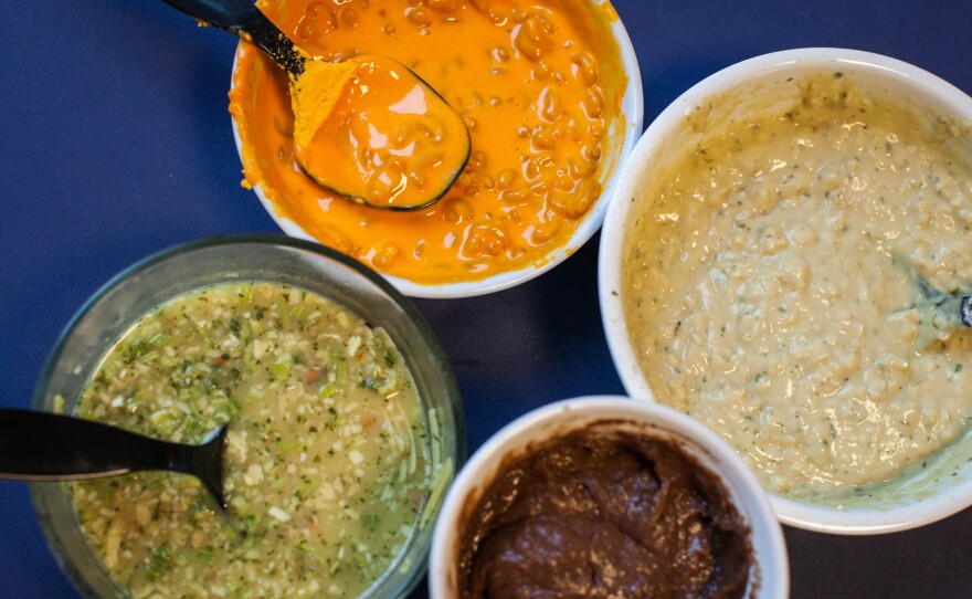 Dishes from Jim Bakker's 50-Day Survival Food bucket, clockwise from top: macaroni and cheese, creamy potato soup, chocolate pudding, chicken noodle soup.